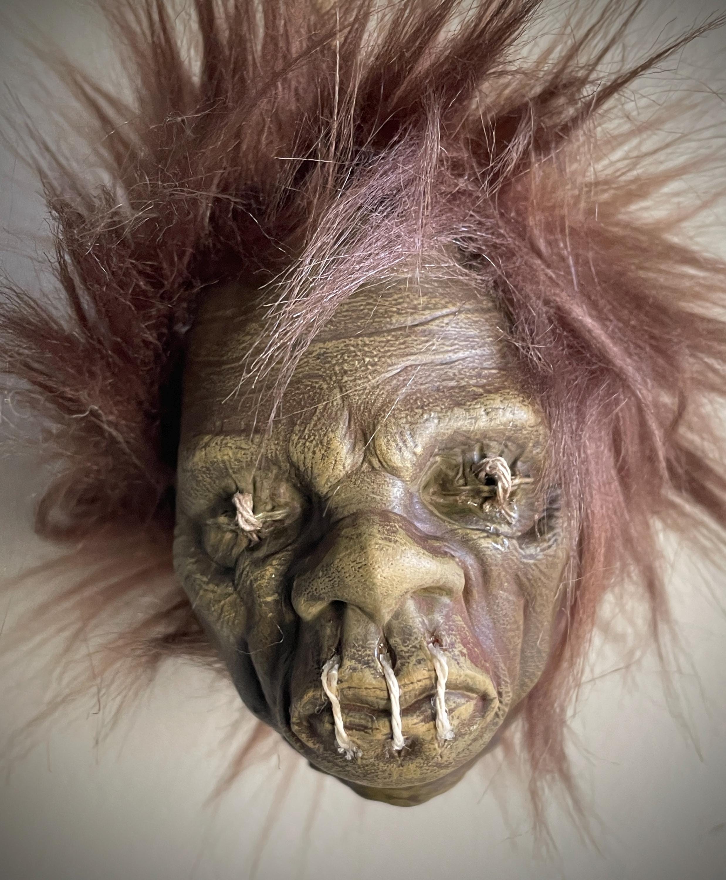 Miniature male Shrunken Head Tsansa Ornament