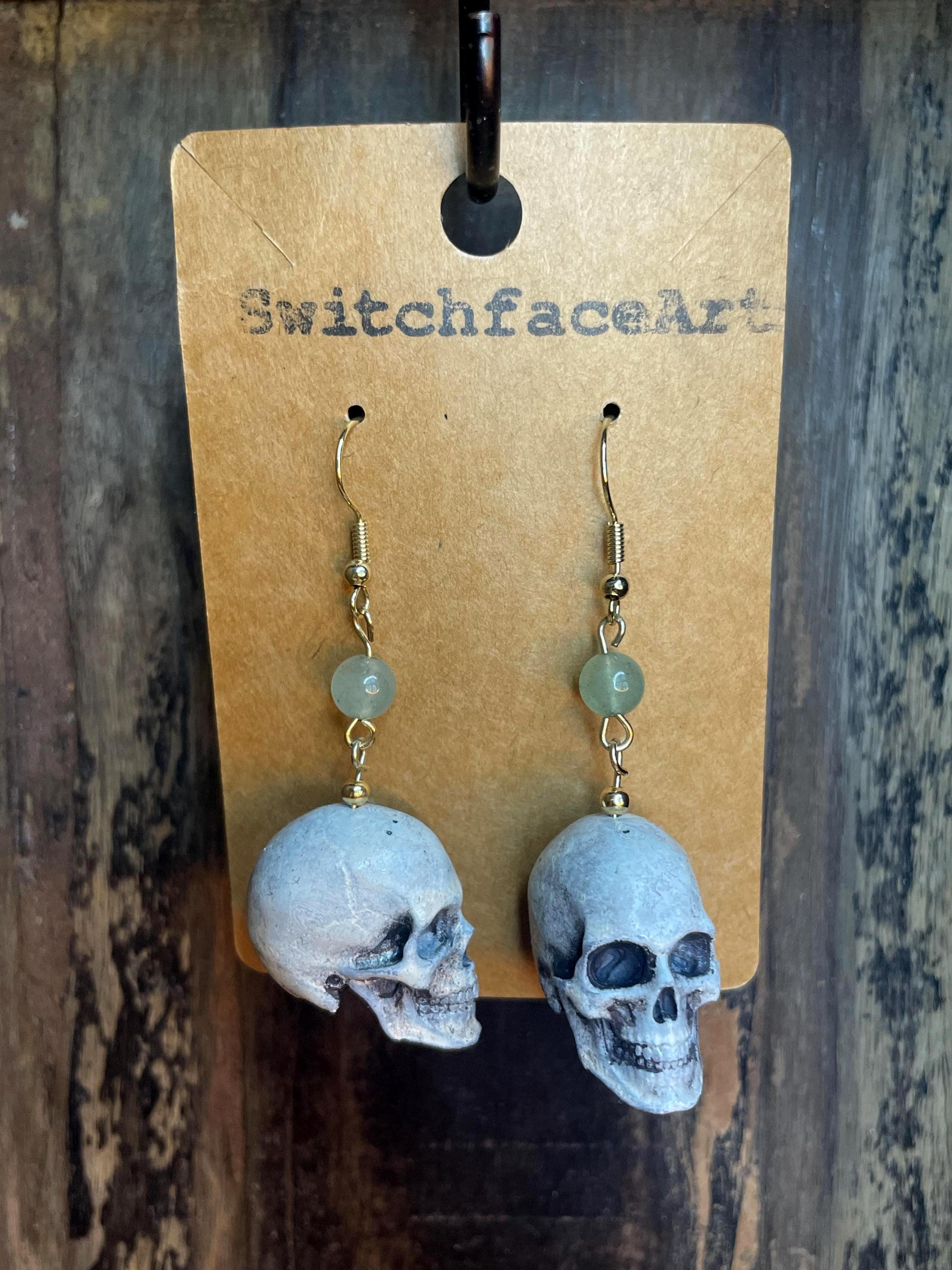 White Skull with Jade Bead