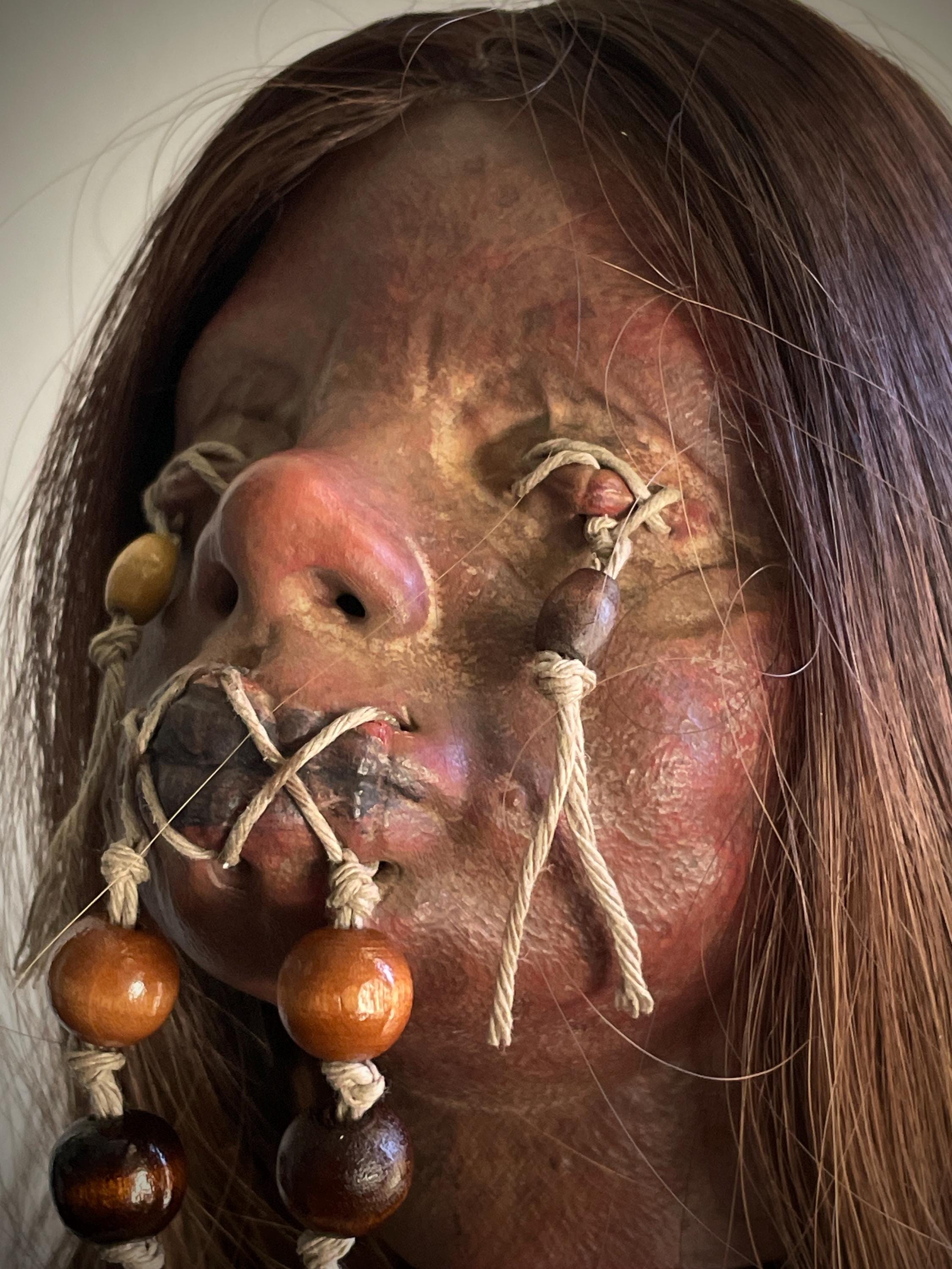 Long Hair Maiden Shrunken Head – Tsantsa Artifact with Display Stand