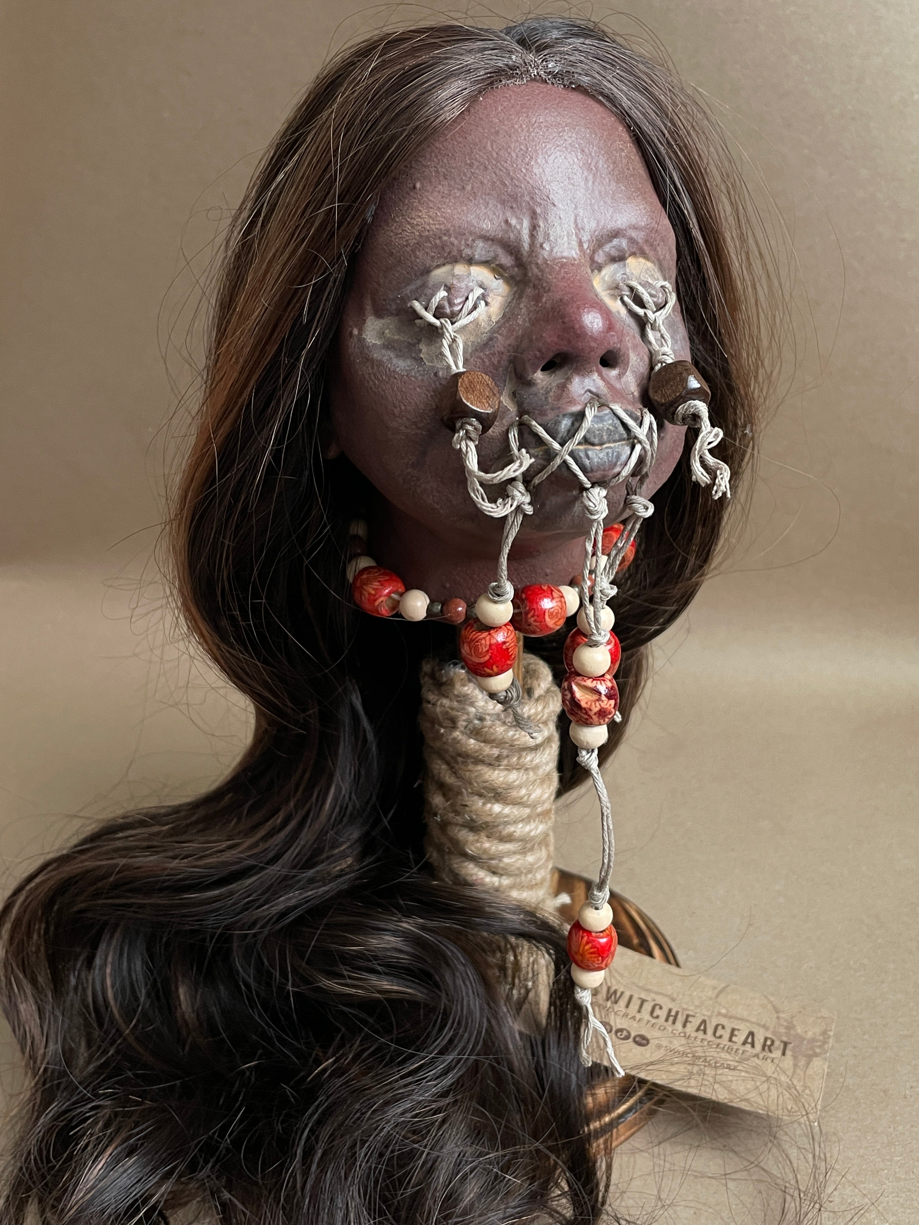 Long Hair Maiden Shrunken Head – Tsantsa Artifact with Display Stand