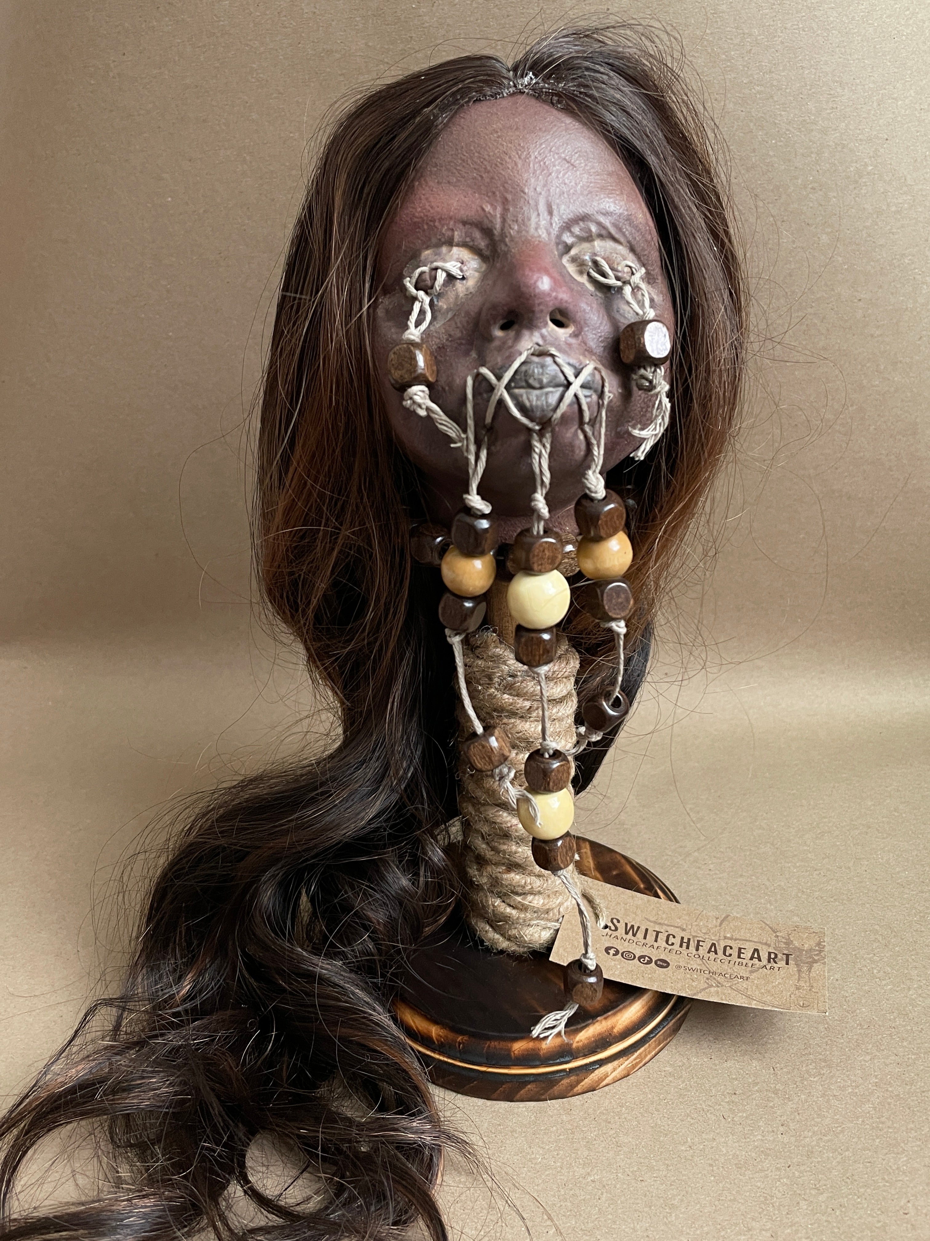 Long Hair Maiden Shrunken Head – Tsantsa Artifact with Display Stand