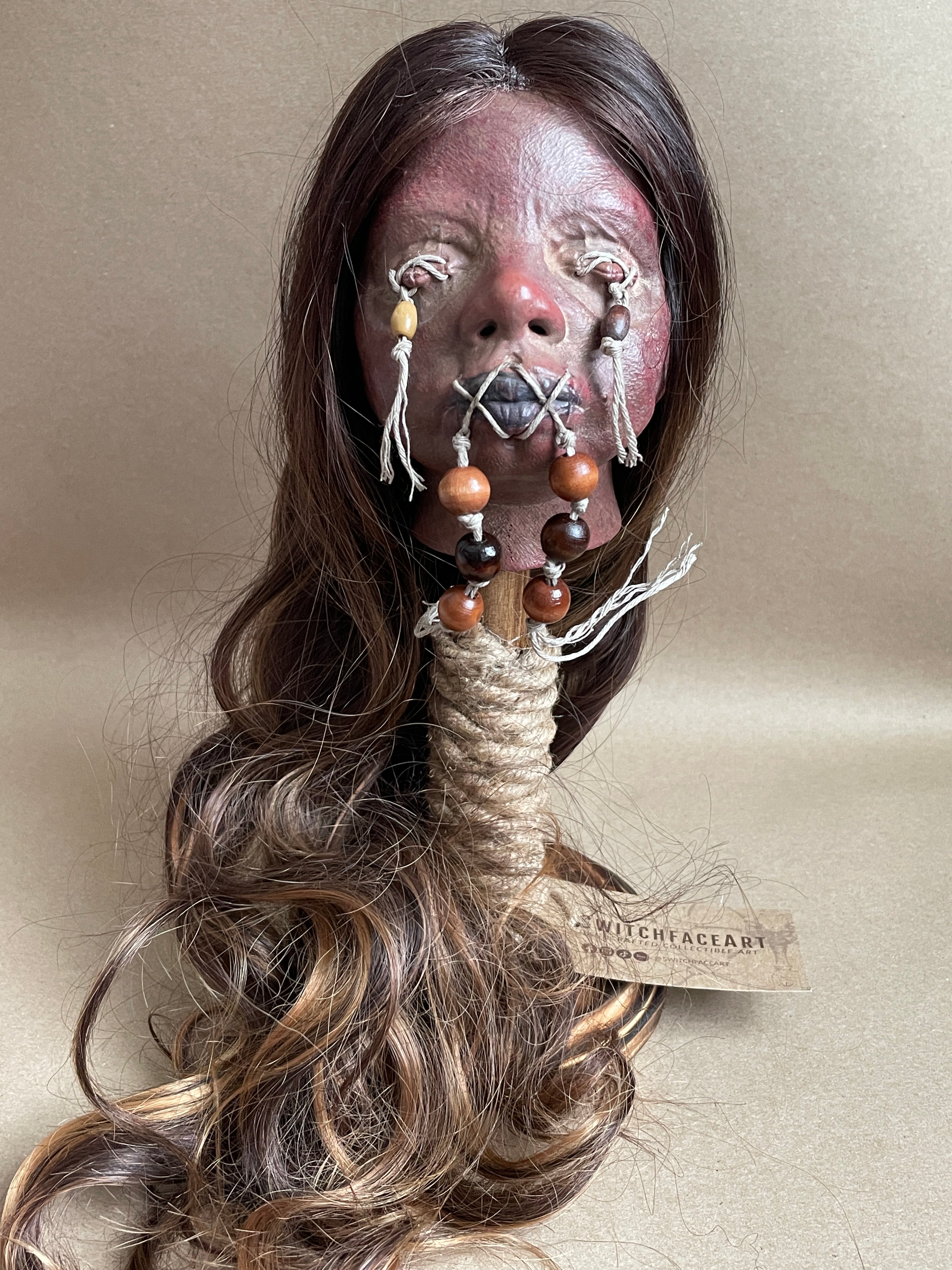 Long Hair Maiden Shrunken Head – Tsantsa Artifact with Display Stand