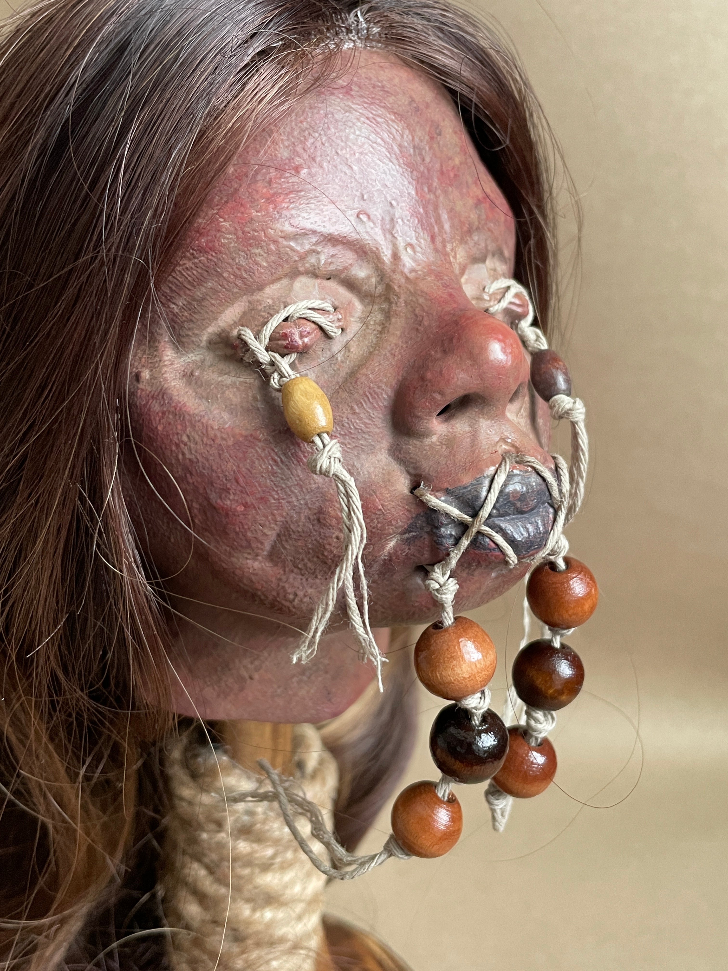 Long Hair Maiden Shrunken Head – Tsantsa Artifact with Display Stand